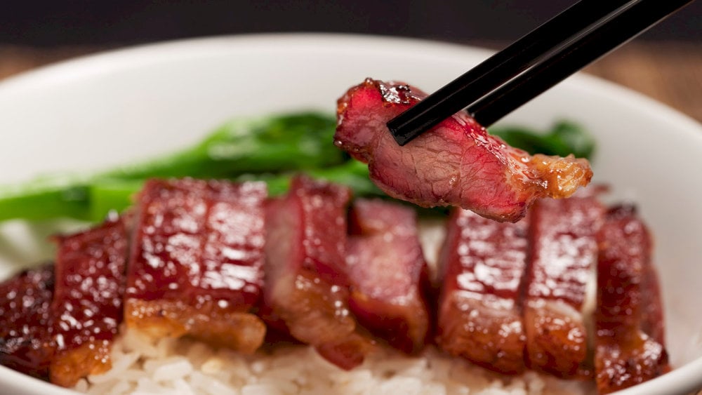 The result is tender, juicy meat with a caramelized exterior, often served sliced